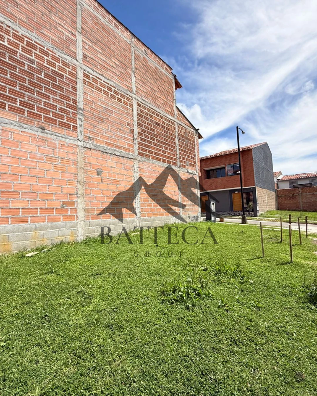 Lote bifamiliar medianero